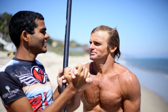 Laird Hamilton and Derek head out for a SUP session in Malibu.