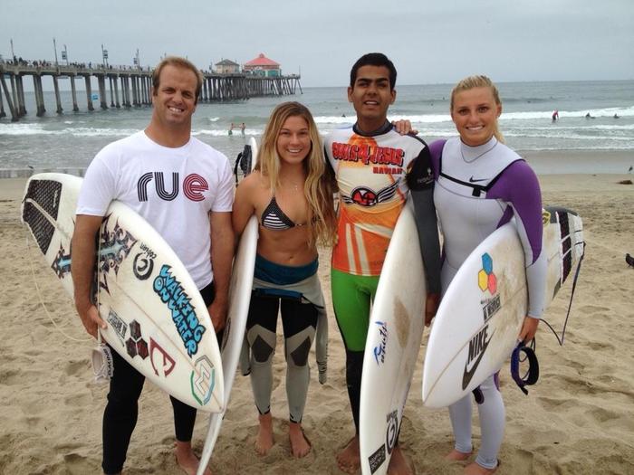 Lakey Peterson and Coco Ho getting ready for a session with Derek and Bryan at Huntington Beach Pier.