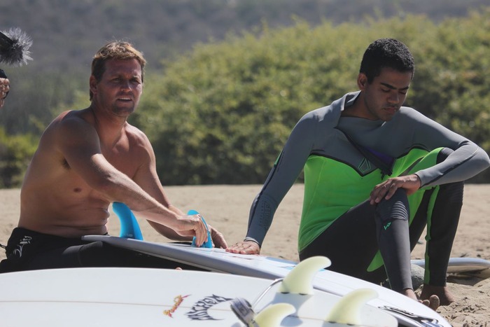 Damien Hobgood gives Derek a board in Southern California.