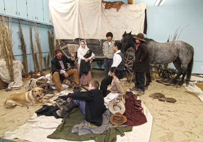 In the class room, yes that is a real horse and this is not a staged scenario.