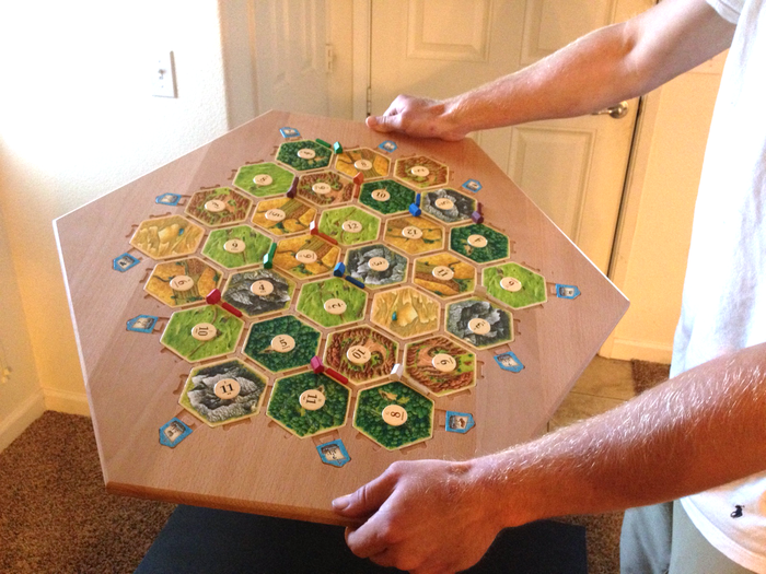 Like all the Catan Boards it holds the pieces quite securely for stability and simple movement to other locations.