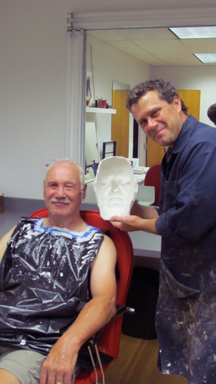 Jeff Buccacio holds up the negative/mold that shows details of Fred's face