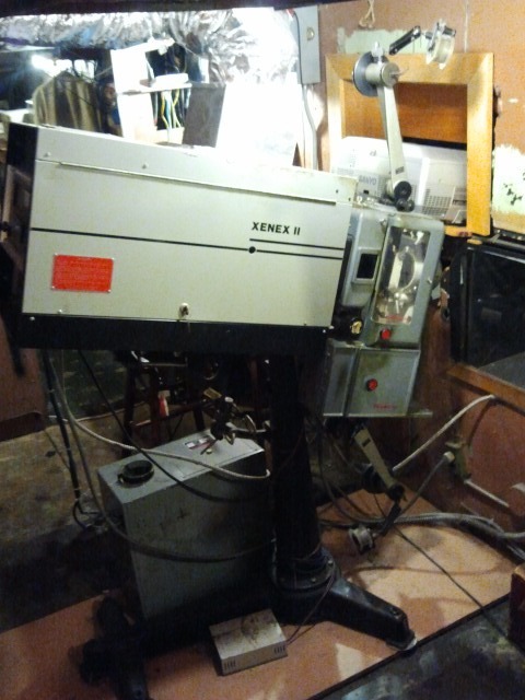Our old 35mm projector, a beast from a bygone era! We will keep her up and running for screening 35mm classics, but she will soon be getting a much deserved rest.