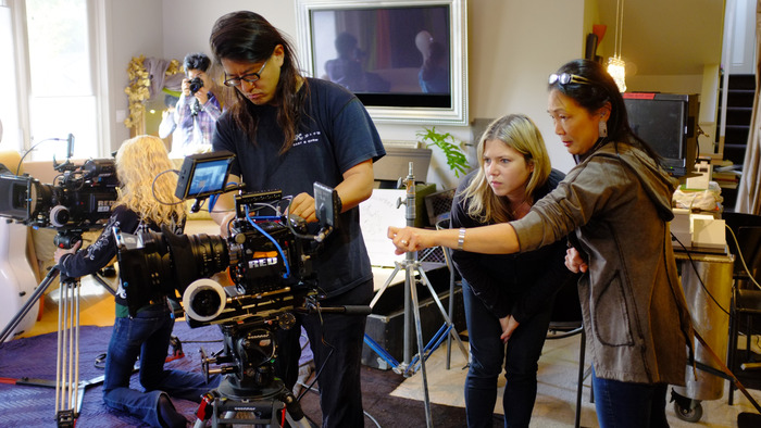 Digital Imaging Technician Stan Paik, Associate Producer Reba Rosenthal and PACO's Vae Sun prepare cameras.