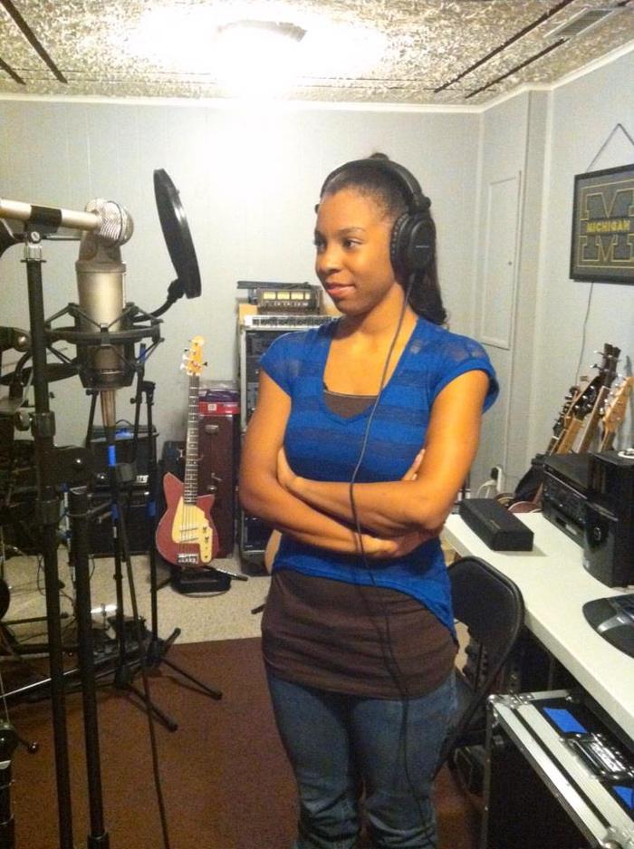 Nicole laying vocal tracks for "Time"