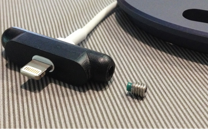Lightning connector adjusted for use with no case. Nylon tipped set screw won’t scratch your cable
