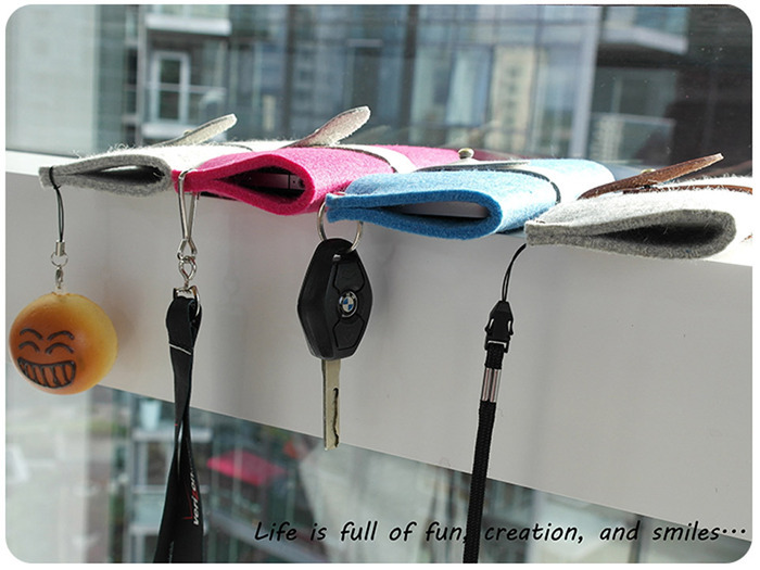 Snap-style closure to secure phone and contents, mix-and-match with key chains, carabiners, wrist-let straps and more. Show off your personality and unique style.