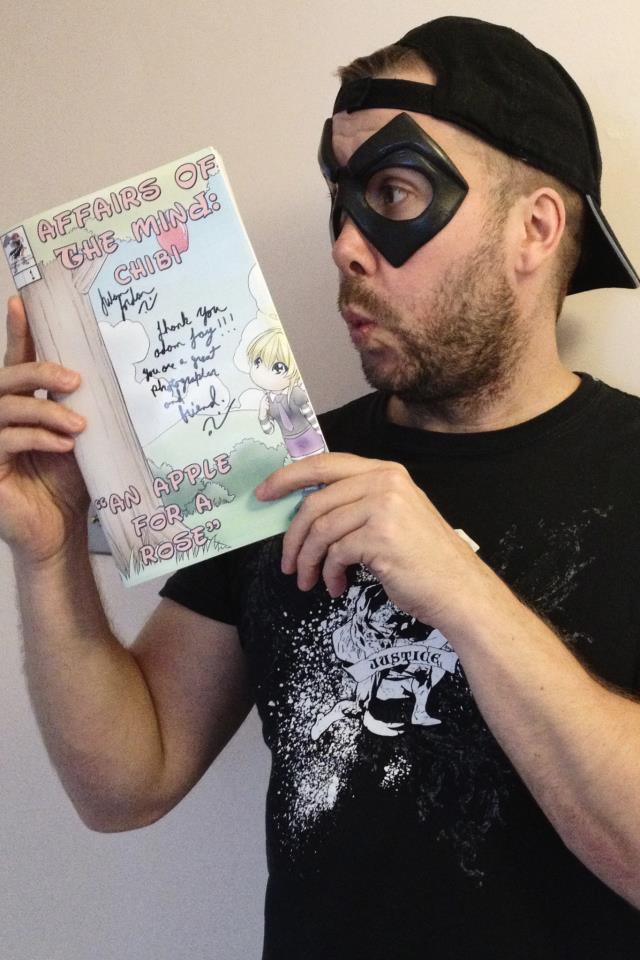 Adam Jay of Super Hero Photography, holding his very own AOTM: Chibi Book