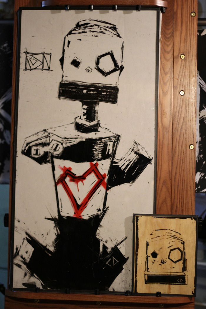 An 8x10 Pinocchio glass original next to an 18x36 pinocchio glass original so folks interested in higher pledges can see how large the 18x36 glass commission will be upon delivery.