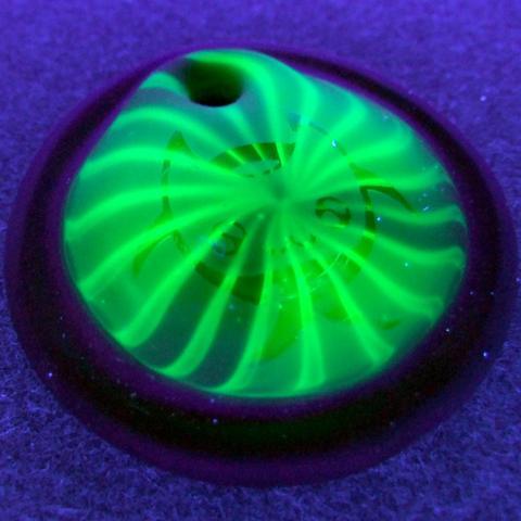 Under UV light, it becomes HYPNO KITTY!