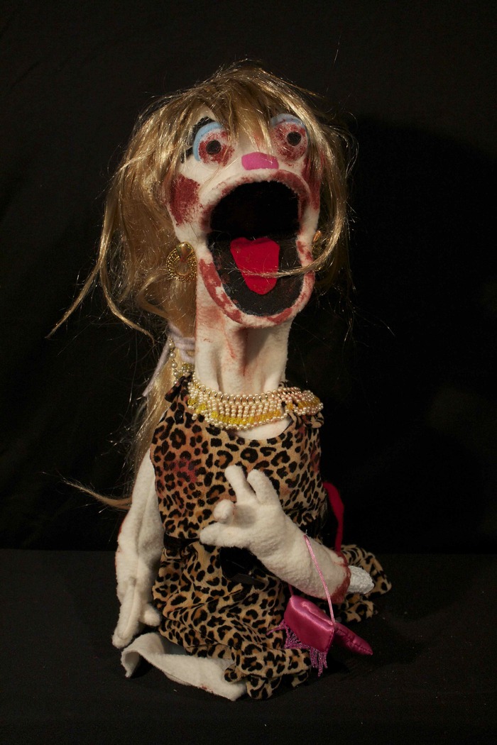 The Cougar - The Cougar was just going out to find some companionship with hot, young men but got cornered and died a splashy death. She's still in search for that virility of youth, but not for the same reasons.