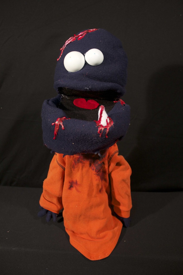 Underbite - Underbite is not one of the smarter zombies. He falls for the survivors' tricks and doesn't get Schminderman's jokes.