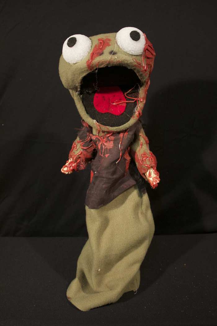 Froggy - Froggy just wanted to get a meal at Romero's but chose the wrong evening. His limbs were taken as a dish of frog legs by old Mr. Schminderman.