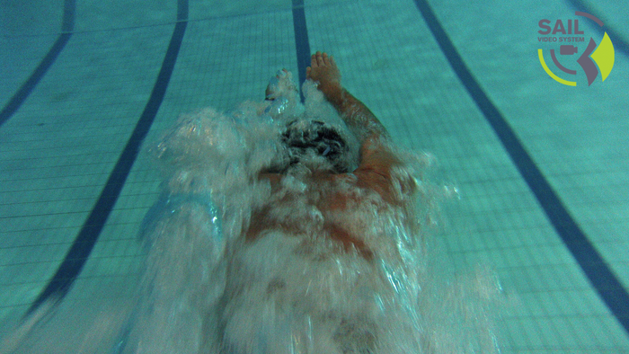 Testing the camera mount on a swimmer while diving.