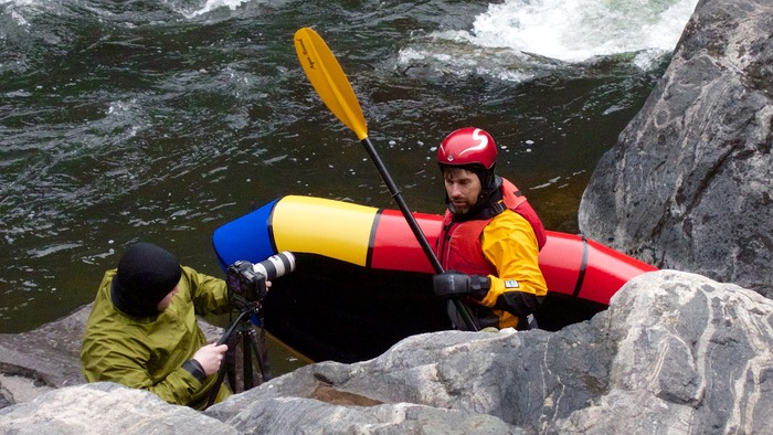 Sasha and Ryan shooting footage for Learn to Packraft! in Montana. Ya gotta love a DP who's standard clothing includes a dry suit.