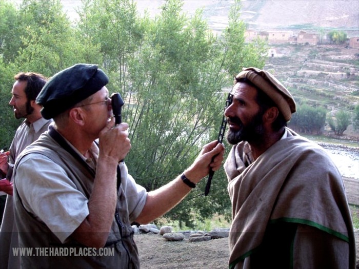 Dr. Tom Little giving eye treatment