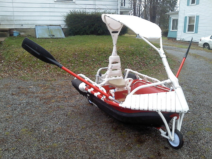 I call this art work , " Plastic pipe dream". I really like how this hard top configuration handle's in and out of the water! If you look closely, you will see a steering lever that folds down under the seat.