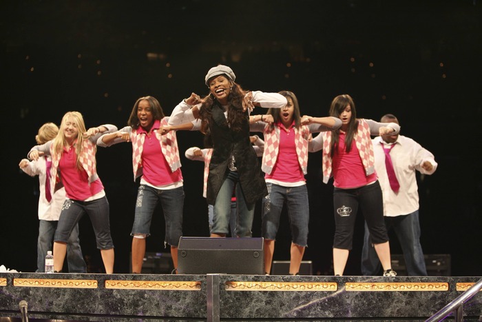 Nicole and Team NCM on stage