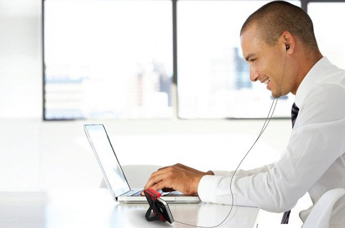 At work on your desk while listening to music.