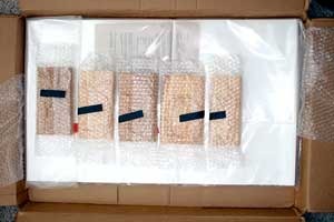 wood type and paper in box for shipping