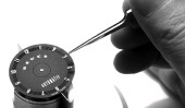 applying the numerals to the dial