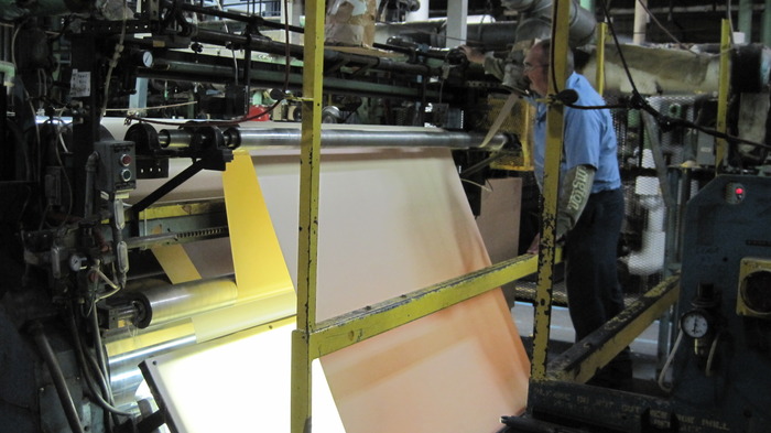 A finished roll of vinyl film.