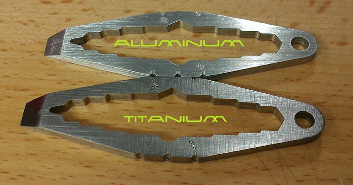 Titanium is a little Darker, otherwise it's hard to tell them apart. They are both the same size, camera adds 10lbs to Titanium. :P