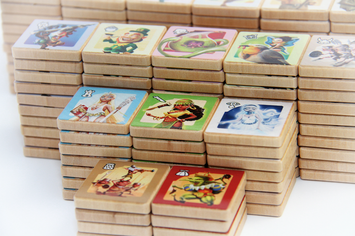 Philippe's original prototype of Small World featured delightful wood tokens; we've finally managed to reproduce them for this very special Designer Edition!