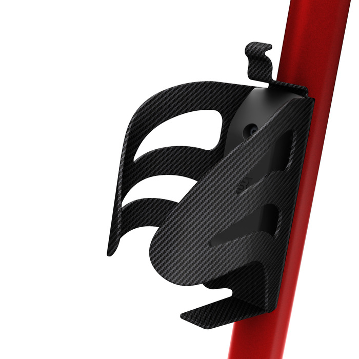 Custom carbon fiber cage on a bicycle frame.