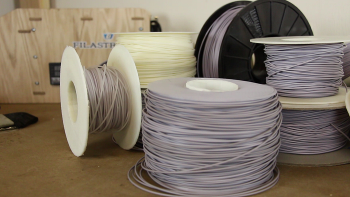 A few of the dozens of spools of filament we've produced so far