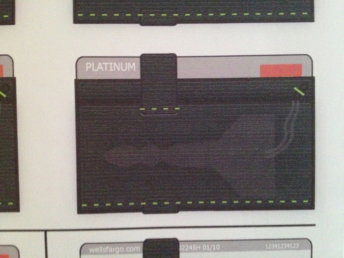 After I hand sketched the wallet, I opened Illustrator to create a version that would allow me to move the pieces around.