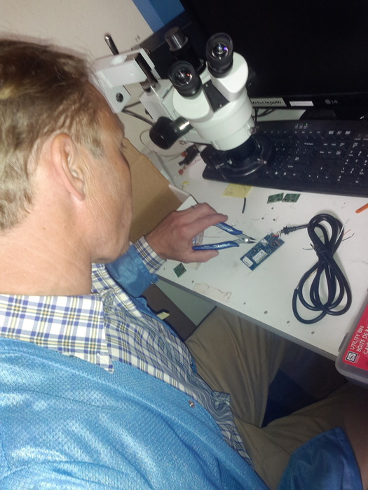 Mark W. working on the communications module