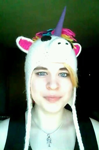 Back me because you're interested in a serious fantasy novel with a unicorn or because you're interested in supporting a silly author in a funny unicorn hat!
