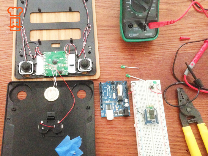 Proof of concept: We took apart one of our manufacturing partners scale, connected a bluetooth module and a microcomputer and sent a signal to our iOS test app. Here they are basking in florescent sunlight.