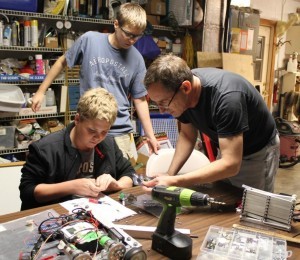 Team members get a lesson on encoders.