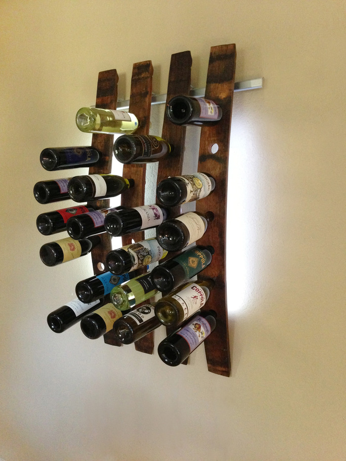Lumi Wine Wall with 4 wine staves holding 28 bottles of wine includes all hardware, 96 SuperBright LEDs and four 12V wall transformers or four battery packs. Once the project ends the retail price of the 4 Lumi Wine Wall will be $480.00.