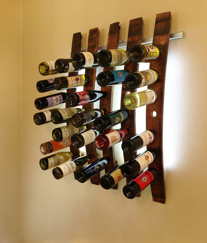 Lumi Wine Wall with 5 wine staves holding 35 bottles of wine includes all hardware, 120 SuperBright LEDs and five 12V wall transformers or five battery packs. Once our project ends the retail price of the 5 Lumi Wine Wall will be $575.00.