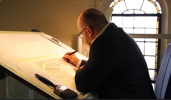 Jonathan Lees working on a Pen & Ink Drawing