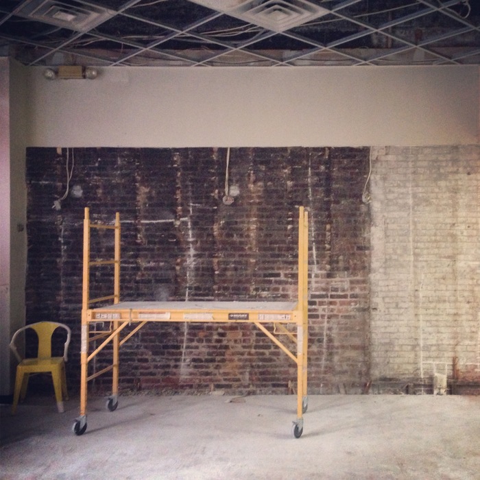 Happy to expose some brick in our first brick & mortar!