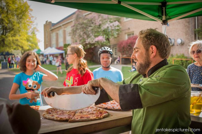 Aaron happily serving up slices at the Gorge Grown Farmers Market