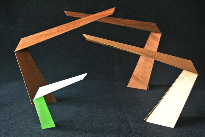 The "Arrow" lamp, paper and wood study models
