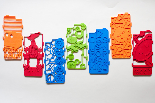 Photograph of sample custom inserts we prototyped. These are some organizations we love, and not available for sale.