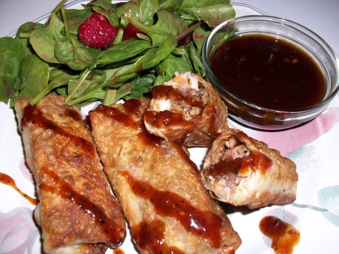 Southern Egg Rolls stuffed with cole slaw and chopped pork butt that was prepared with the Rib Rub and Spicy BBQ dipping sauce; Raspberry and Raisin Spinach Salad with a Raspberry and Lemon dressing.