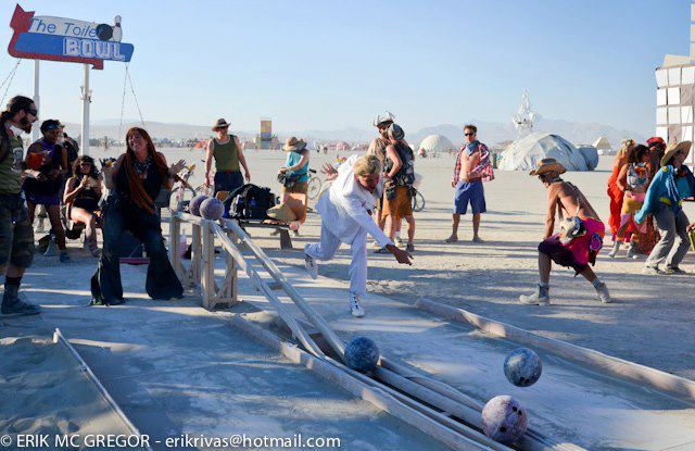 Reverend Billy rolls a strike at The Toilet Bowl in 2012. Photo by Erik McGregor.