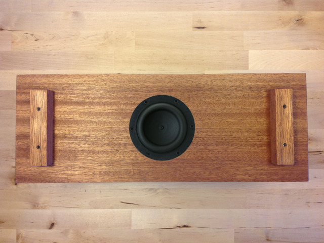 Mounted in the down-throw position in a sealed enclosure, Duo sports the world's only miniature long-throw subwoofer.