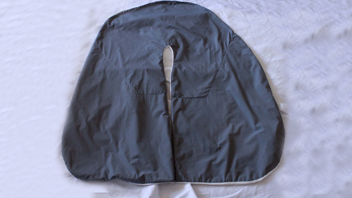 BUNDEL JOURNEY - The travel blanket that seals in warmth around your shoulders, neck, and core. Won't fall off your shoulders while sleeping upright. Stuff a neck pillow inside or use it by itself.