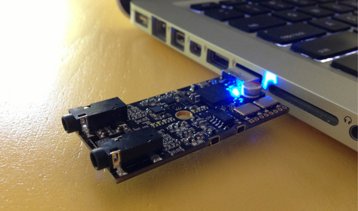 GEEK's naked circuit board plugged into MacBook Pro