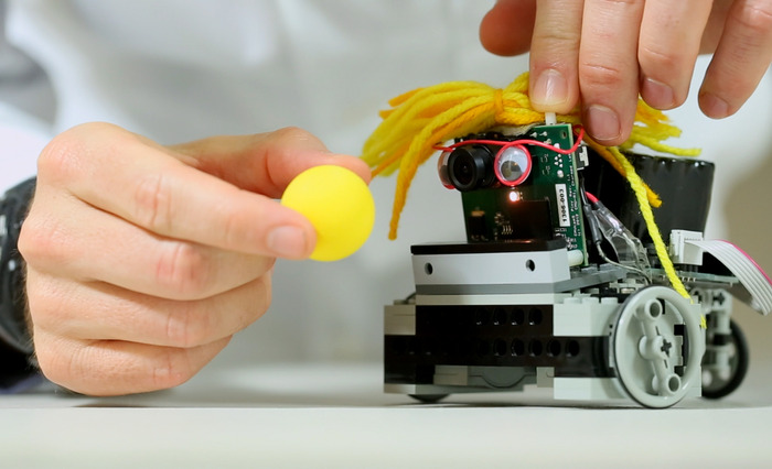 Pixy being taught. When color LED matches the color of the object, release button. Pixy will then find objects that match.