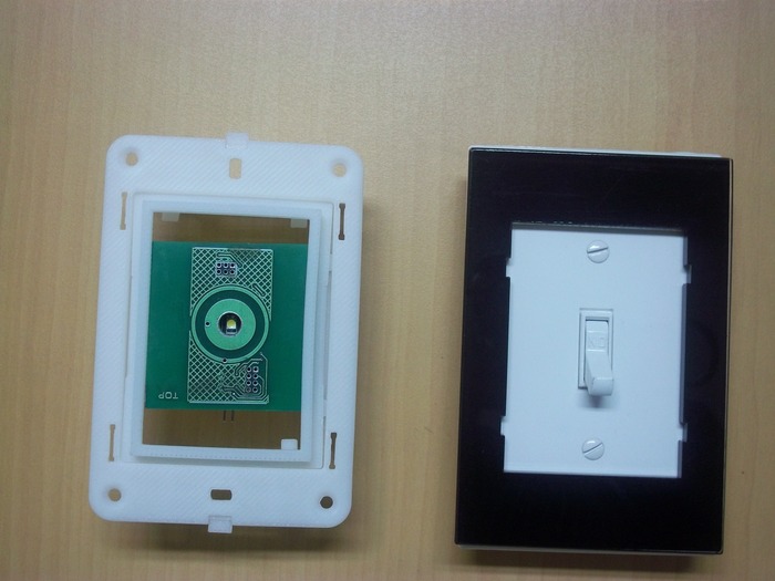 Adoratouch Mounting frame compared with a Decora Wall plate