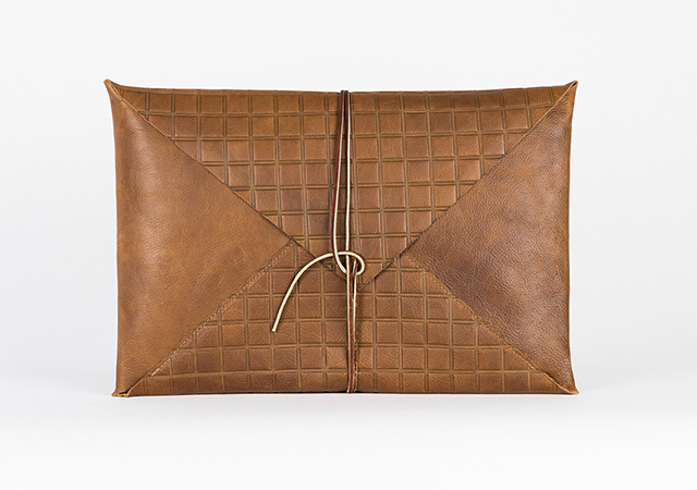 Newman Gridded laptop case available at stretch goal.